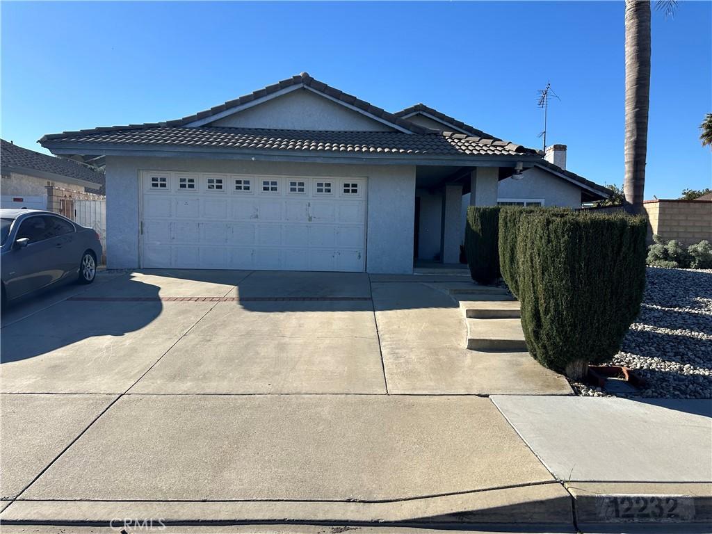 view of front of property with a garage