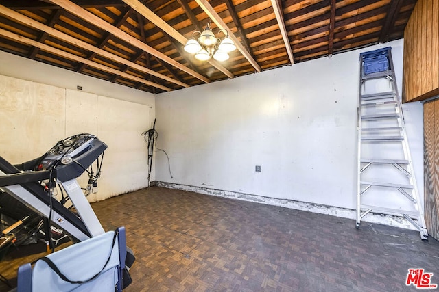 workout area with vaulted ceiling