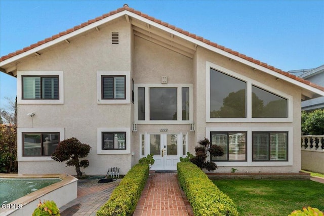 back of house with french doors