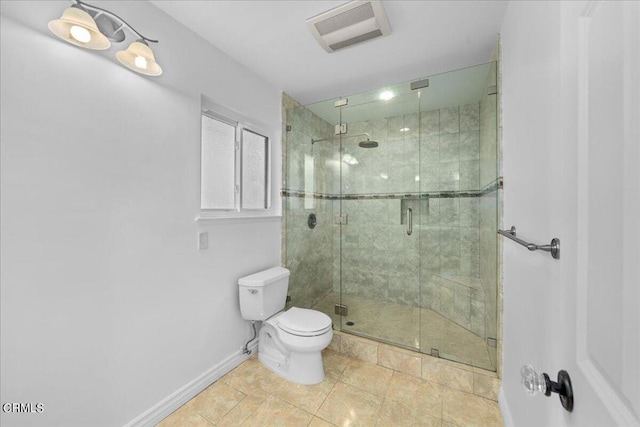 bathroom featuring tile patterned flooring, an enclosed shower, and toilet