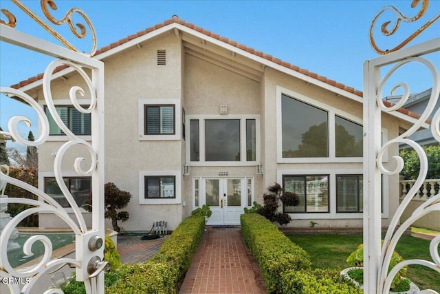 view of front facade featuring french doors