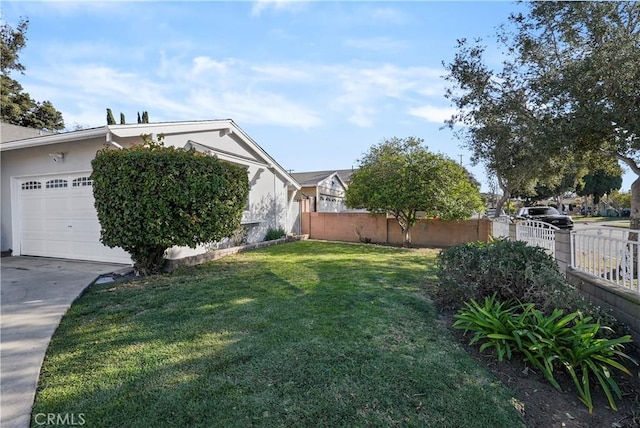 view of yard with a garage