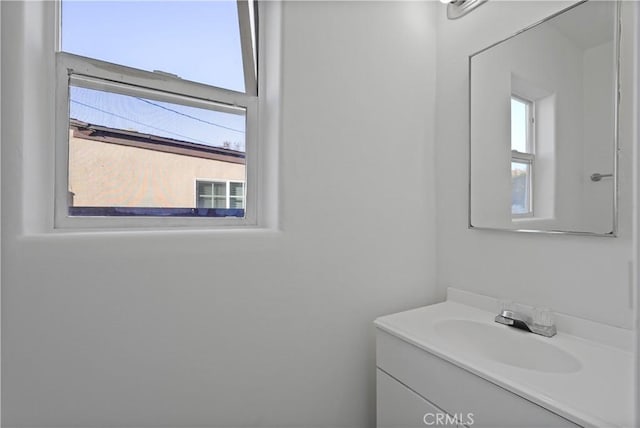 bathroom featuring vanity and plenty of natural light