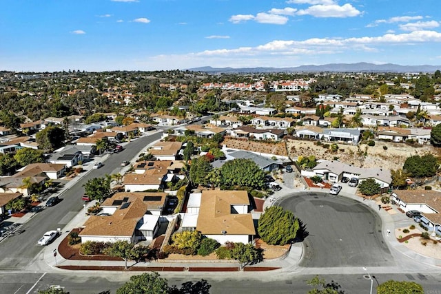 drone / aerial view featuring a mountain view