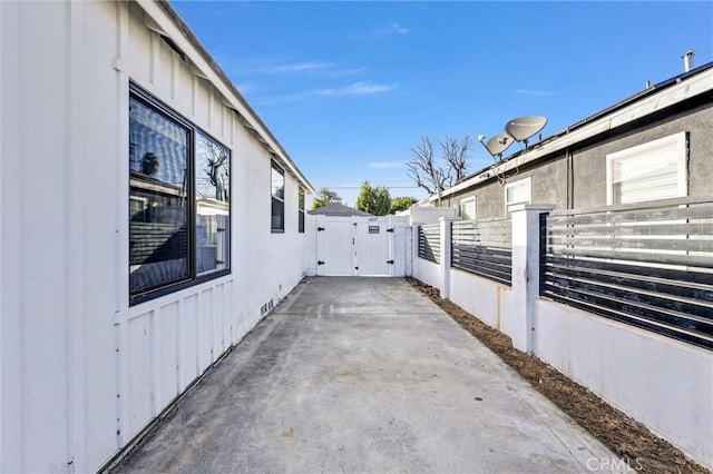 view of side of property featuring a patio