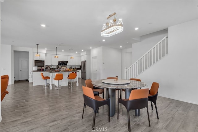 dining room with a notable chandelier