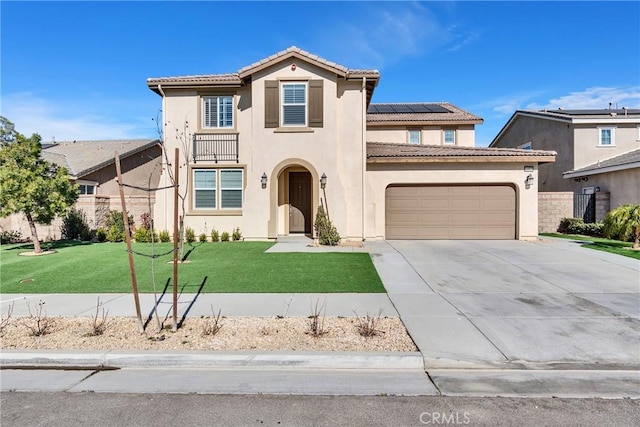 mediterranean / spanish-style home with solar panels, a front lawn, and a garage