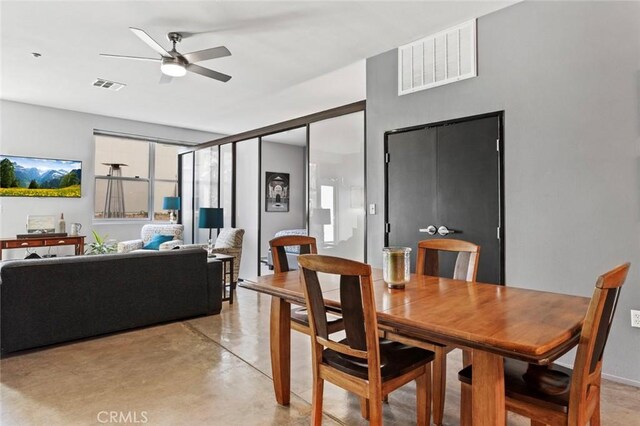 dining area with ceiling fan