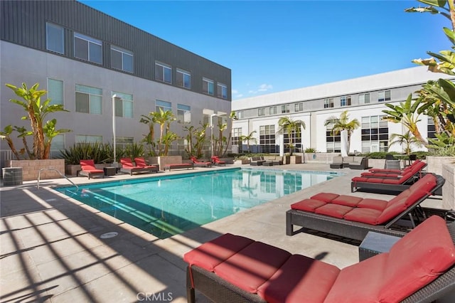 view of pool featuring a patio area