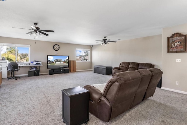 living room with ceiling fan and light carpet