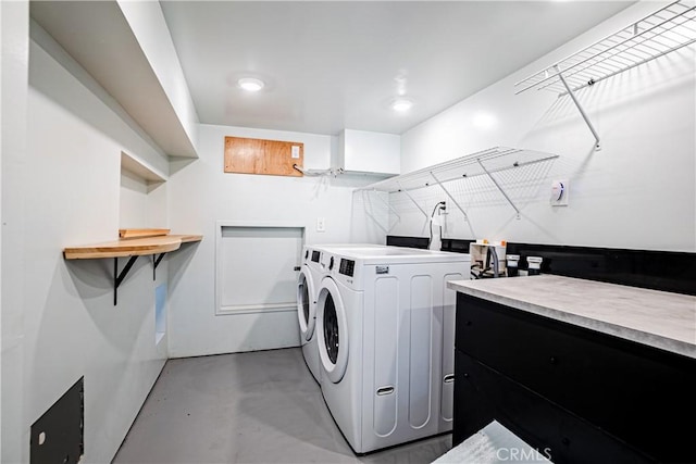 washroom featuring washer and dryer