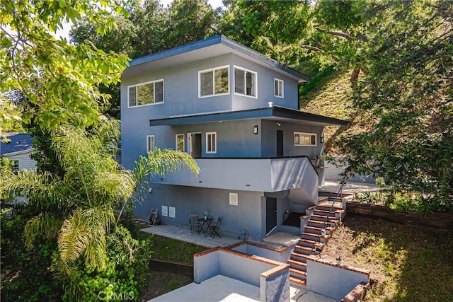 view of front of property with a patio area