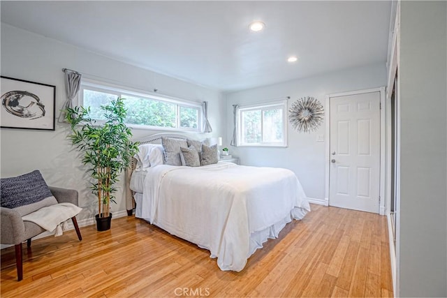 bedroom with light wood-type flooring