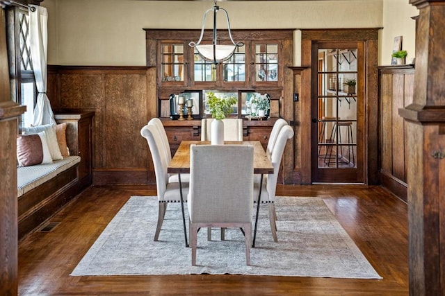 dining room with dark wood-type flooring