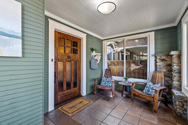 doorway to property with covered porch