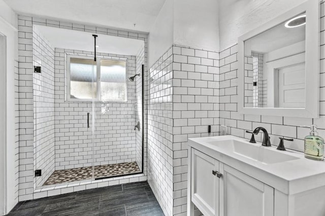 bathroom featuring vanity and walk in shower