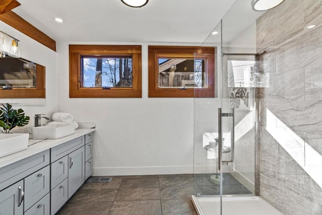 bathroom featuring vanity and walk in shower