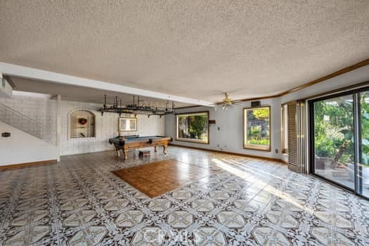 playroom with billiards, ceiling fan, and crown molding