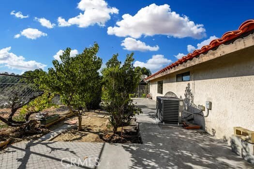 view of patio with cooling unit