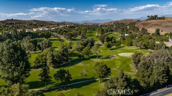 drone / aerial view featuring a mountain view