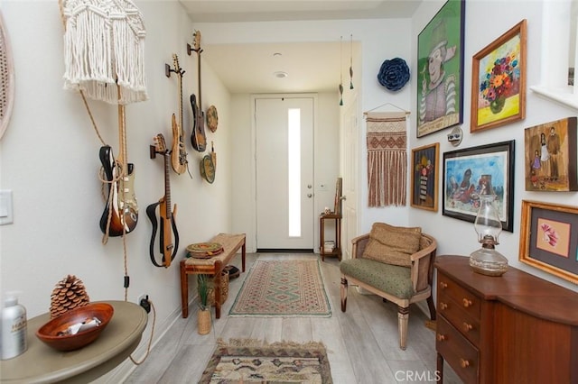 foyer with light wood-type flooring