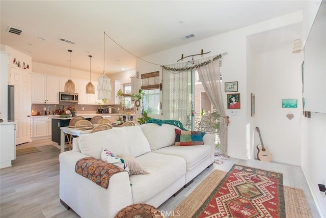 living room with light wood-type flooring