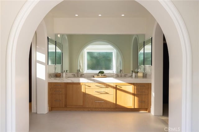 bathroom featuring vanity and tile patterned flooring