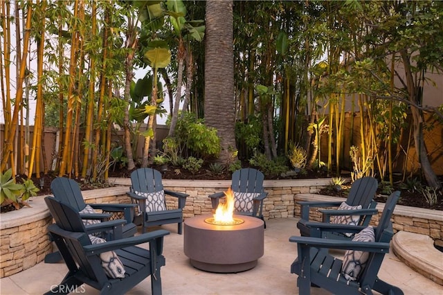 view of patio / terrace featuring a fire pit