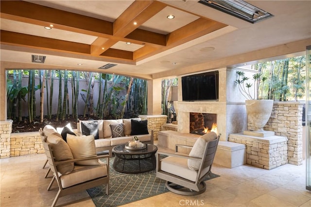 exterior space with an outdoor living space with a fireplace