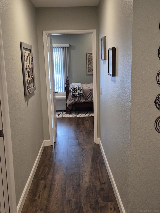 hall featuring dark hardwood / wood-style floors