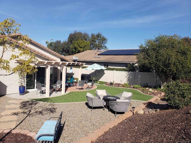 view of yard featuring an outdoor fire pit, a pergola, and a patio area