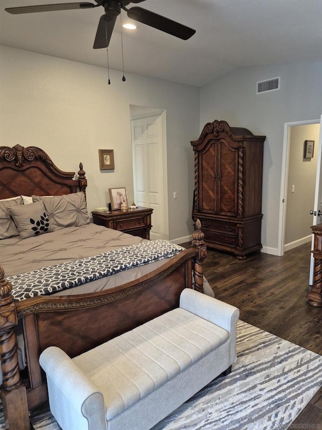 bedroom featuring ceiling fan and dark hardwood / wood-style flooring