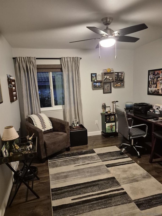 office space with ceiling fan and dark hardwood / wood-style floors