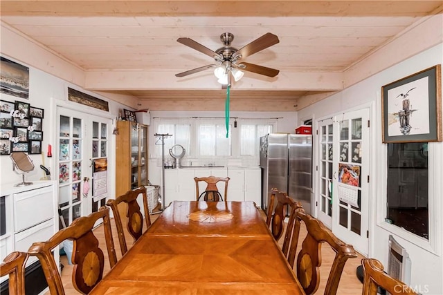 dining room featuring french doors, wooden ceiling, and ceiling fan