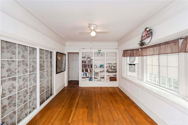 interior space featuring ceiling fan