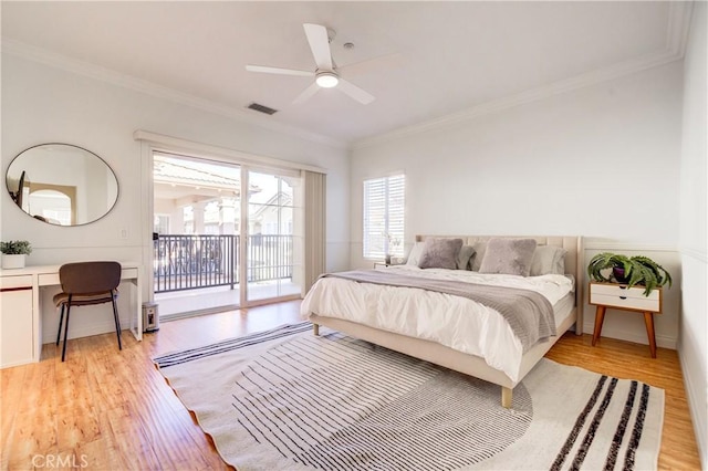 bedroom featuring ceiling fan, access to exterior, ornamental molding, and light wood-type flooring