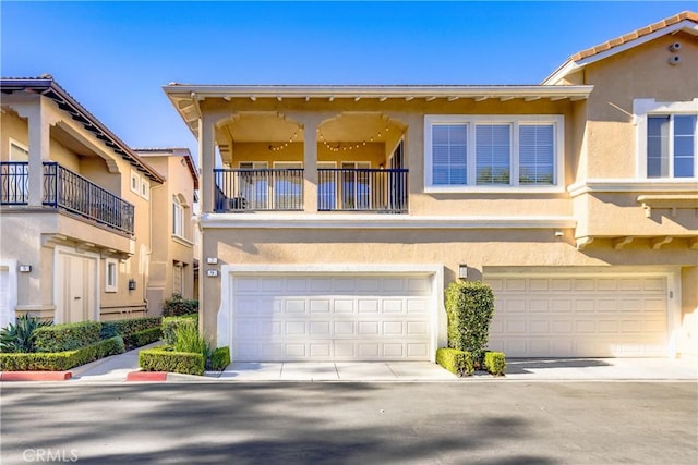 townhome / multi-family property featuring a garage