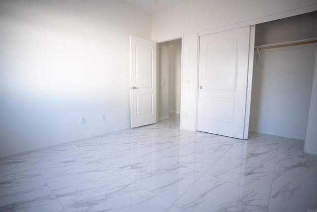 unfurnished bedroom featuring a closet