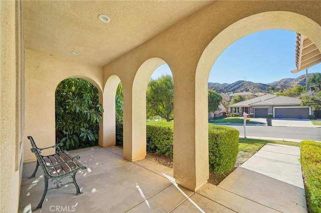 view of patio with a mountain view