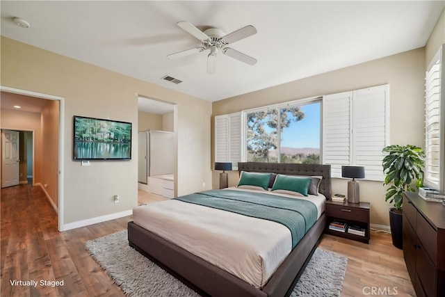 bedroom featuring wood-type flooring and ceiling fan