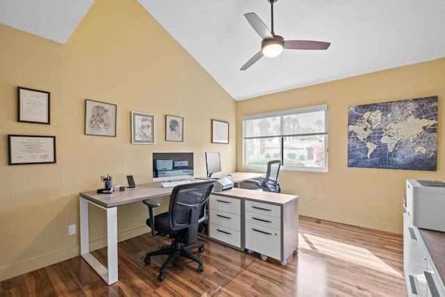 office featuring high vaulted ceiling, ceiling fan, and light hardwood / wood-style floors