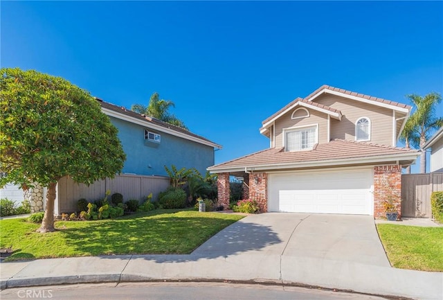 view of front property featuring a front yard and a garage