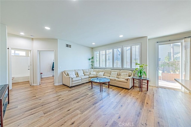 living room featuring light wood-type flooring