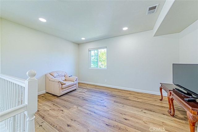 living area featuring light hardwood / wood-style flooring