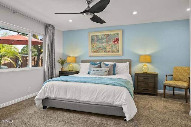 bedroom featuring ceiling fan and carpet