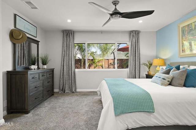 bedroom with ceiling fan and carpet