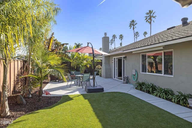 view of yard with a patio area