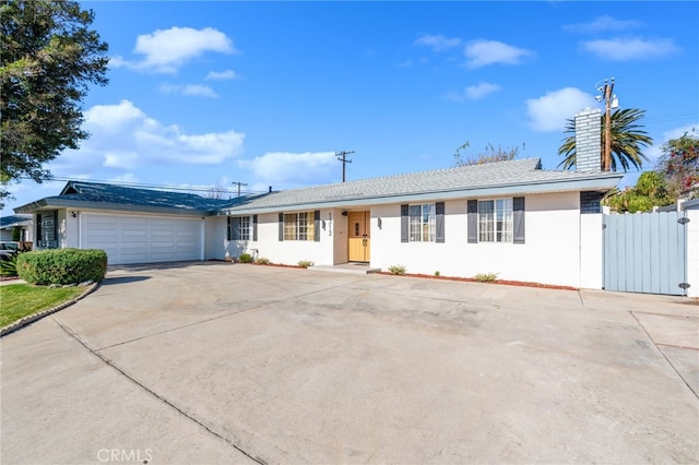 ranch-style home with a garage