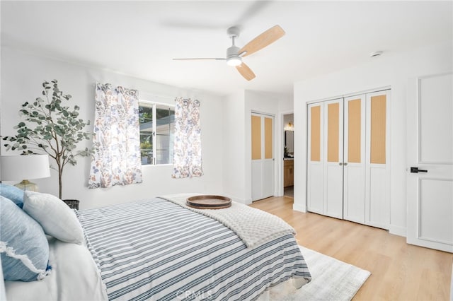 bedroom featuring a closet, ceiling fan, and light wood-type flooring