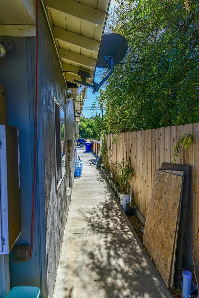 view of patio featuring fence